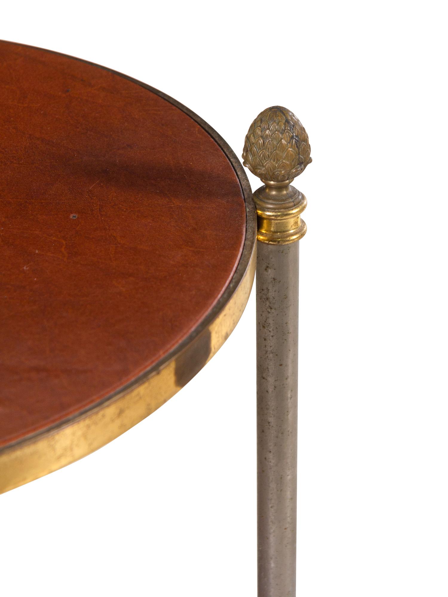 A French Steel and Brass Leather-Top Table in the Style of Maison Jansen