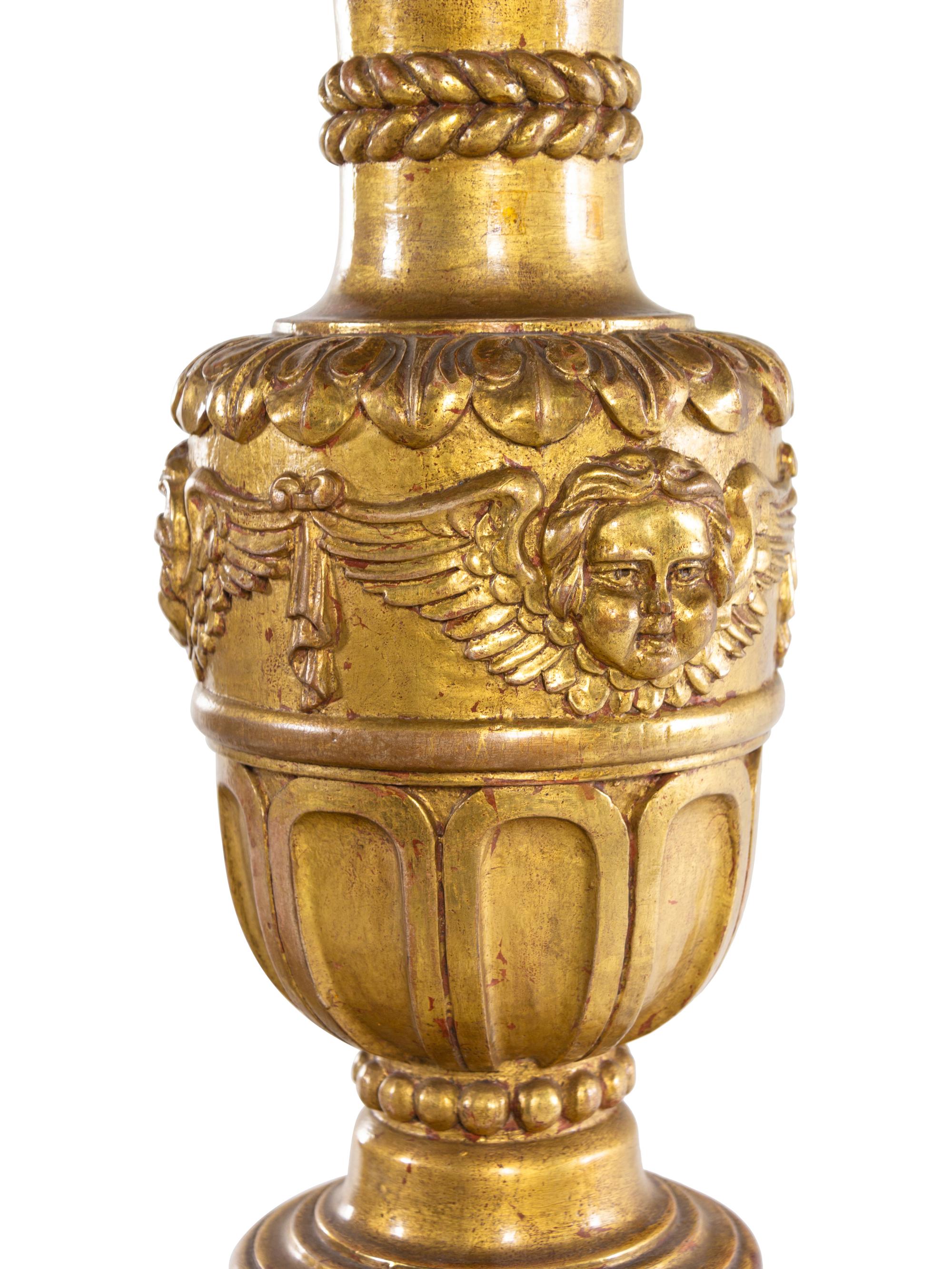 A Pair of Italian Baroque Style Giltwood Torchères