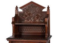 with carved floral and butterfly motifs