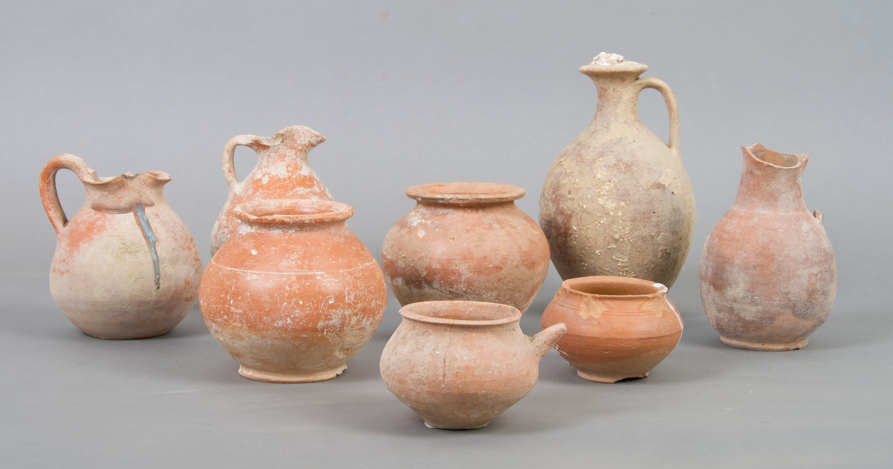 A Collection of Ten Roman or Near East Earthenware Vessels, Height of tallest 7 inches.