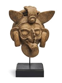 A Maya Polychrome Terracotta Head of a Deity