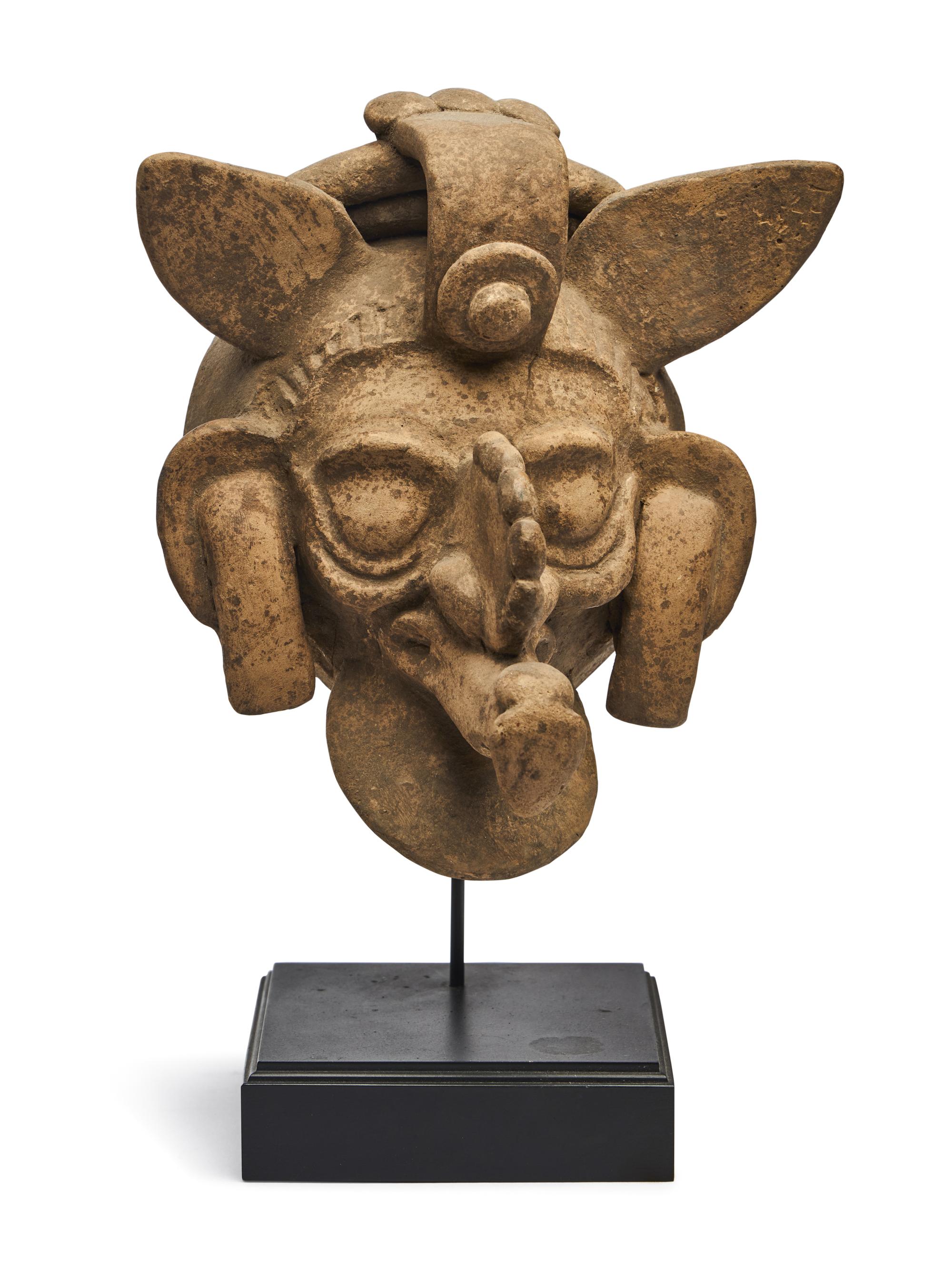 A Maya Polychrome Terracotta Head of a Deity