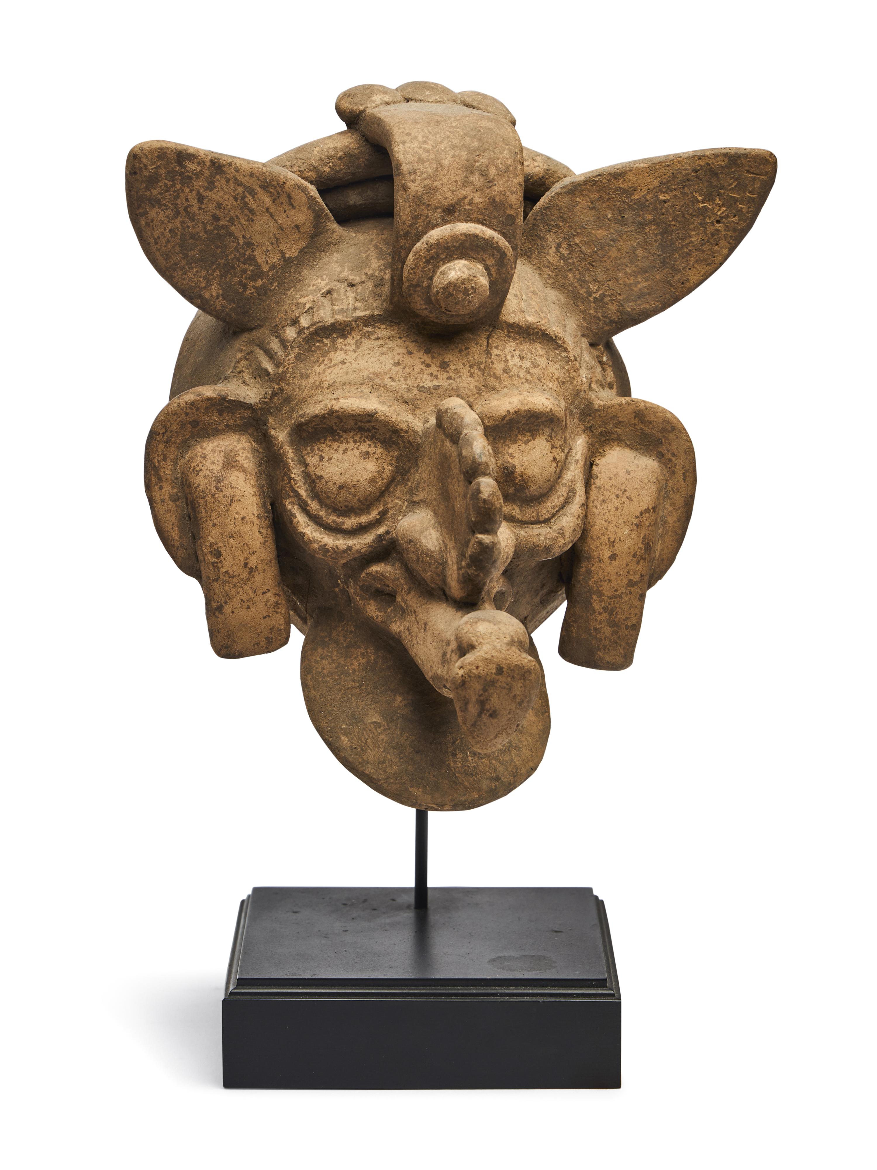 A Maya Polychrome Terracotta Head of a Deity