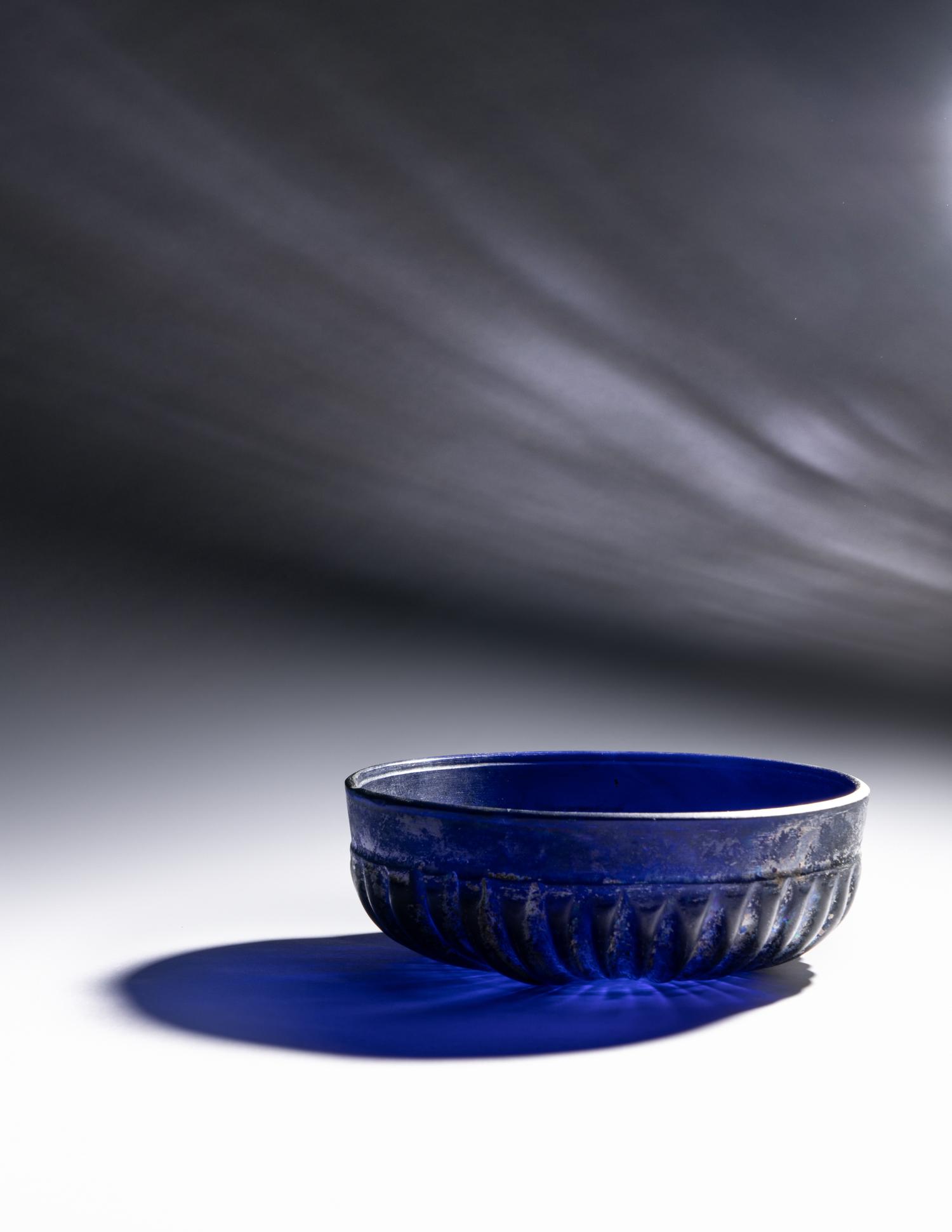 A Roman Cobalt Blue Molded Glass Bowl