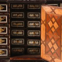 A Spanish Marquetry and Gilt Metal Mounted Collector's Cabinet