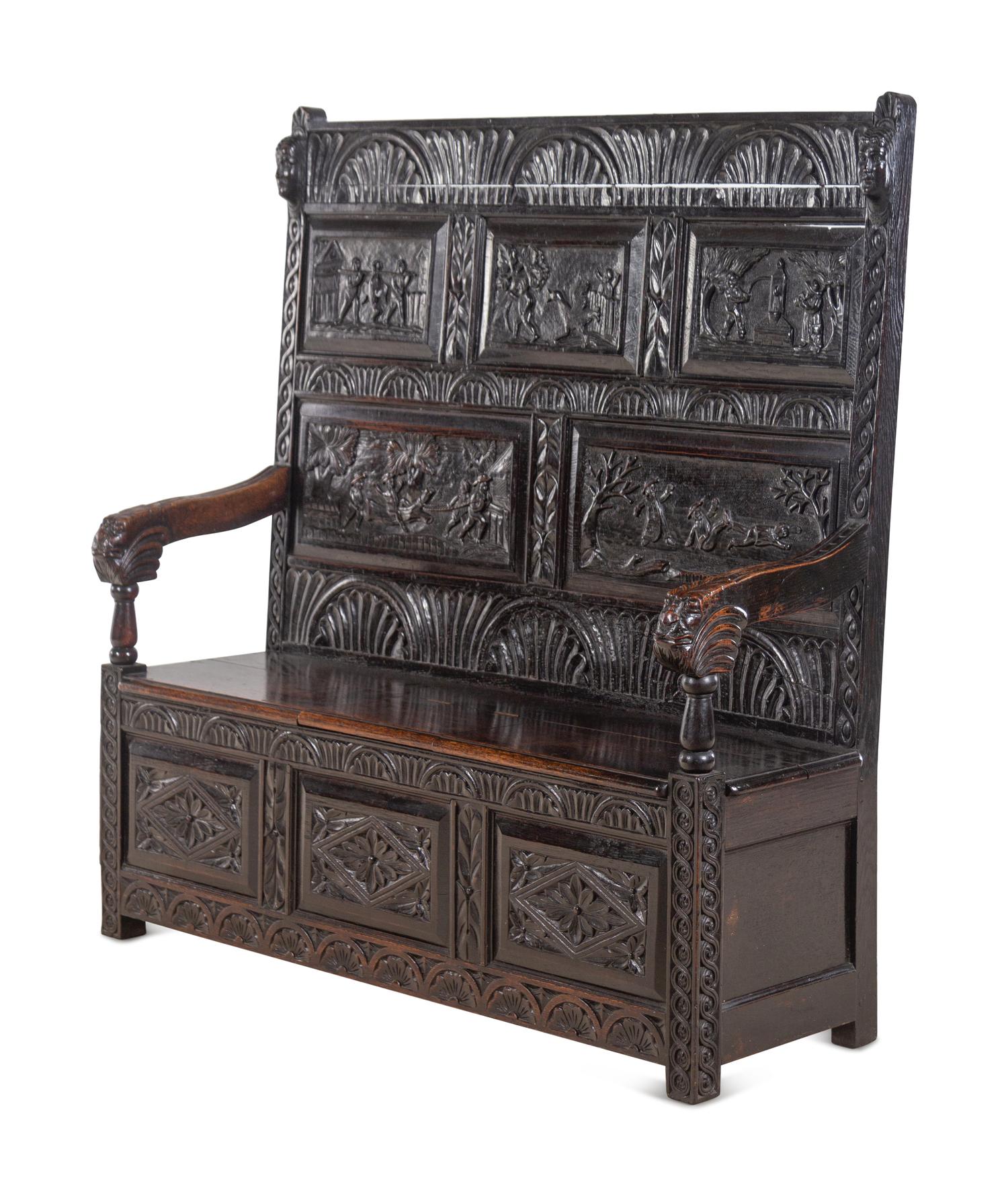 A William and Mary Style Carved Oak Settle