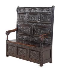 A William and Mary Style Carved Oak Settle