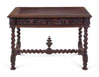 A Baroque Revival Carved Oak Table