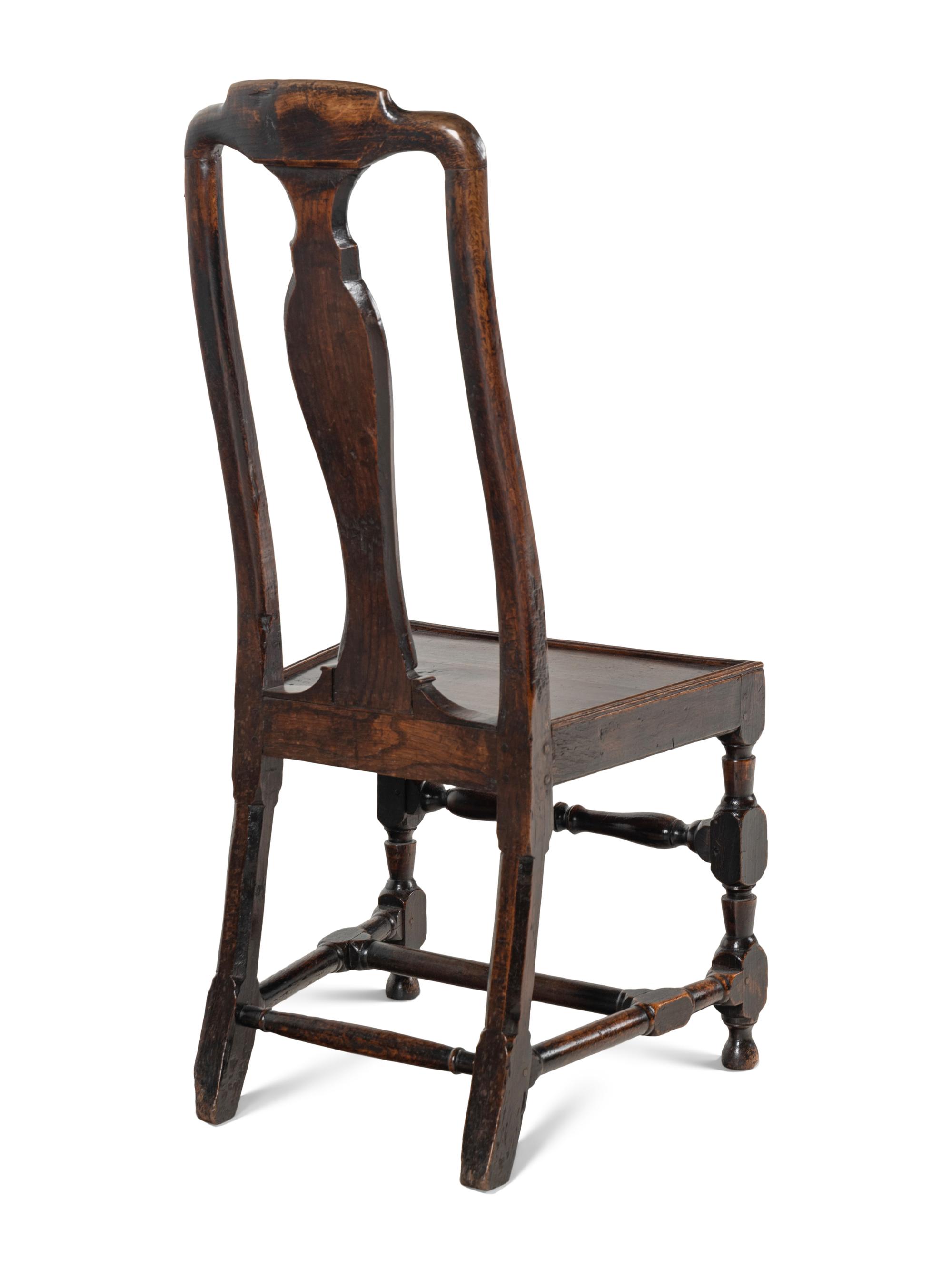 A Pair of Queen Anne Oak 'Solid Seat' Side Chairs