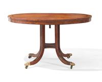 A Regency parcel-ebonized pollard oak breakfast table, circa 1820