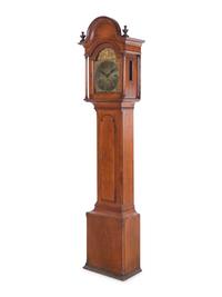 A Queen Anne Walnut Tall Case Clock