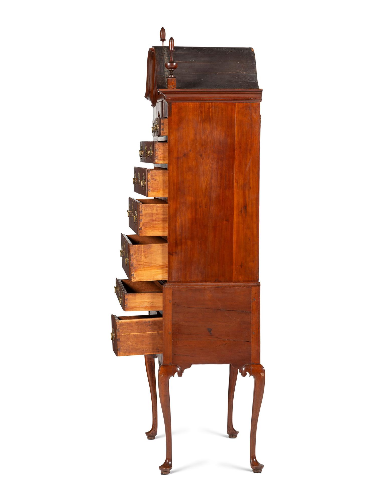 A Queen Anne Fan-Carved Cherrywood Bonnet-Top High Chest