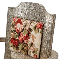 A Pair of Anglo-Colonial Silvered Metal-Clad Swiveling Armchairs