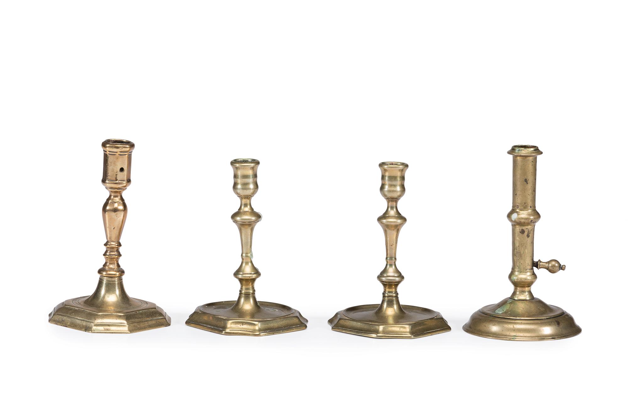 Four English Brass Candlesticks