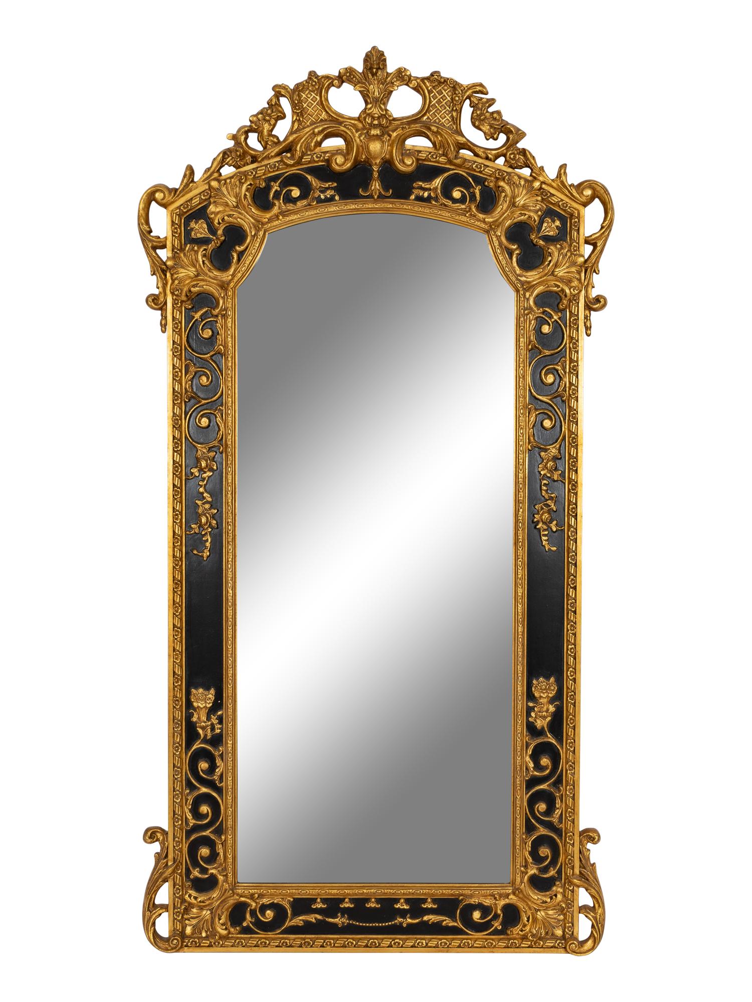 A Large Rococo Style Ebonized Parcel Gilt Pier Mirror