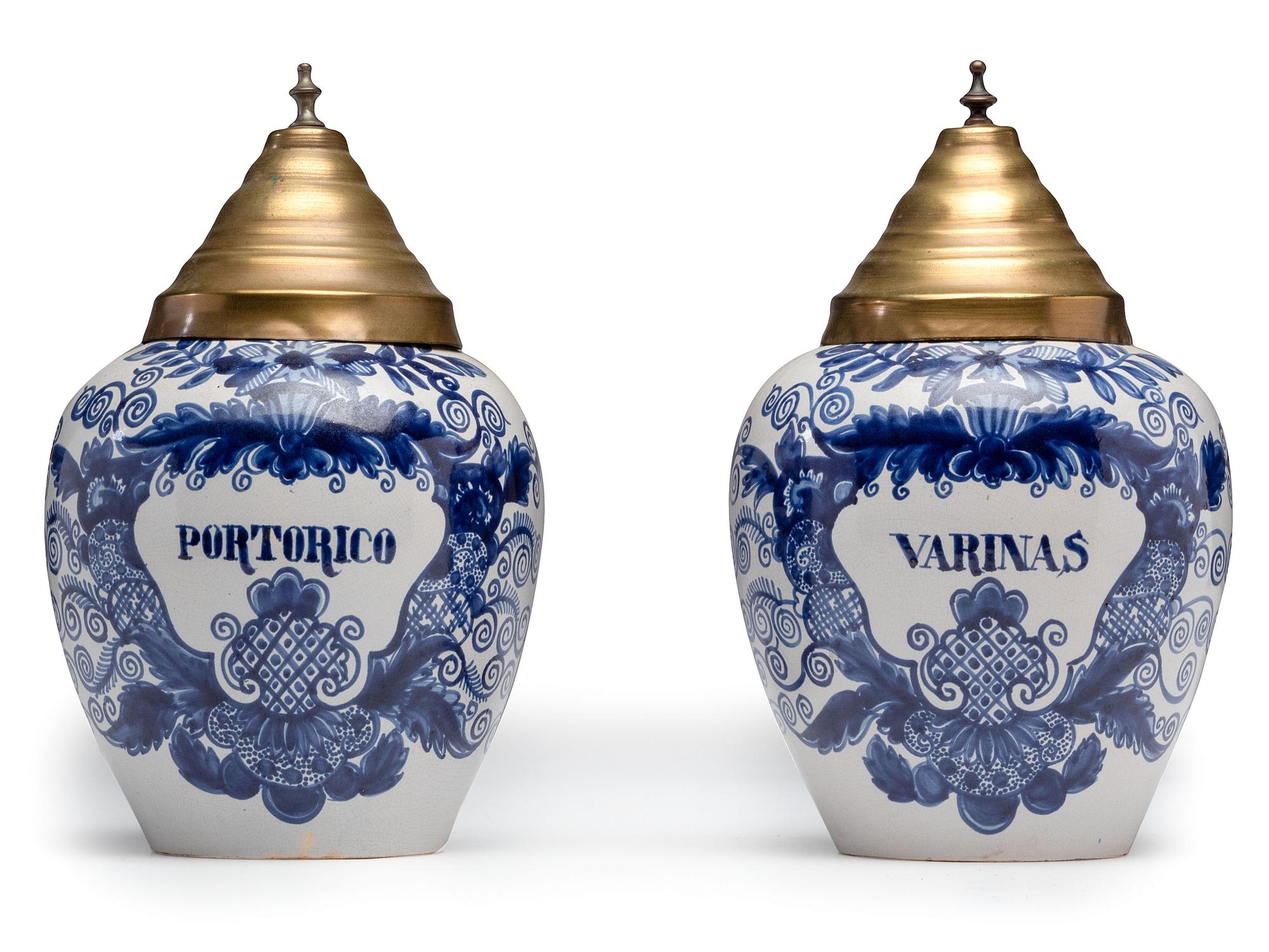 A Pair of Delft Lidded Tobacco Jars