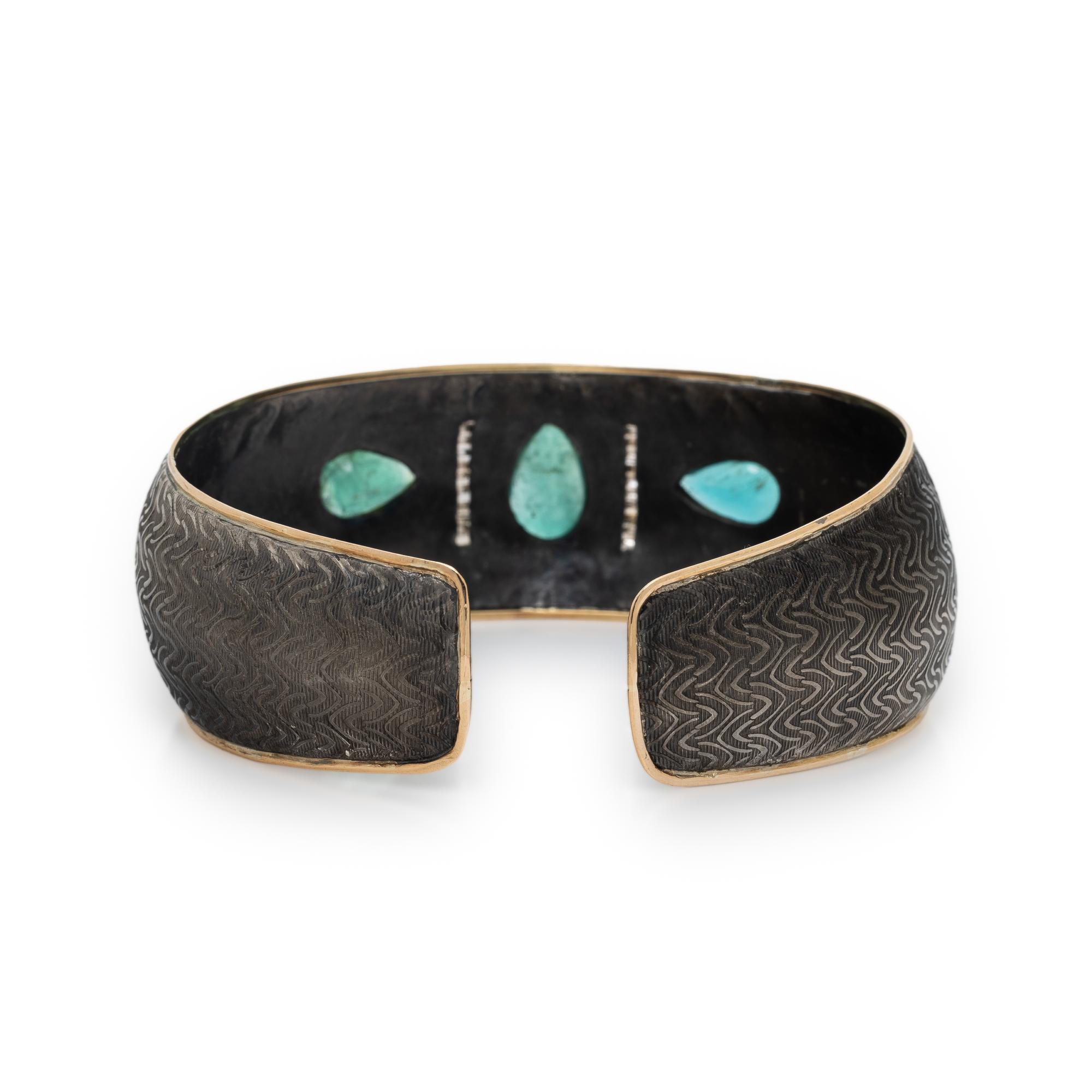 EMERALD, DIAMOND, SILVER, AND YELLOW GOLD CUFF BRACELET