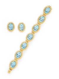 YELLOW GOLD AND BLUE TOPAZ BRACELET AND EARRINGS