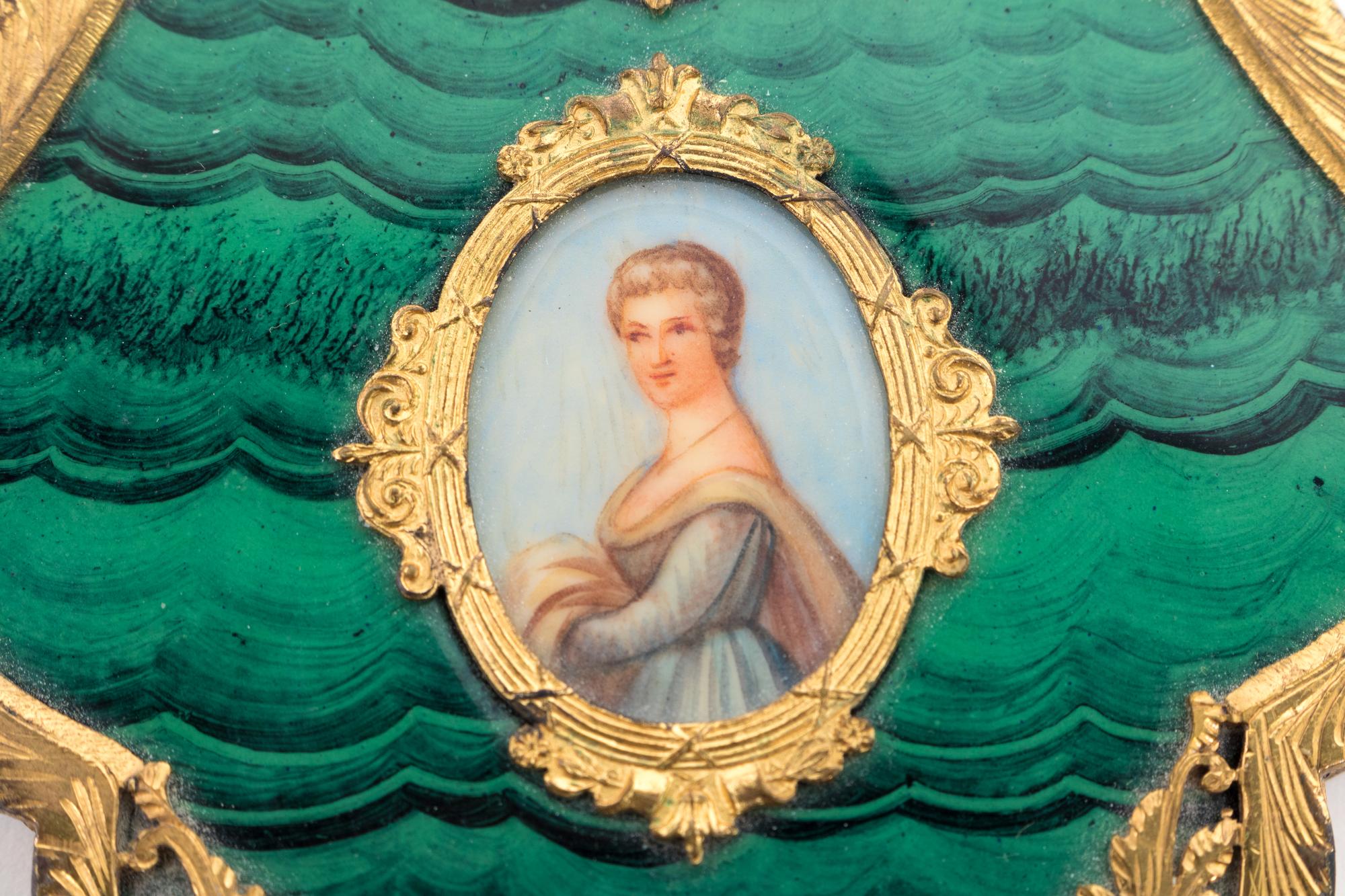 A Continental Gilt Metal and Faux Malachite Compact