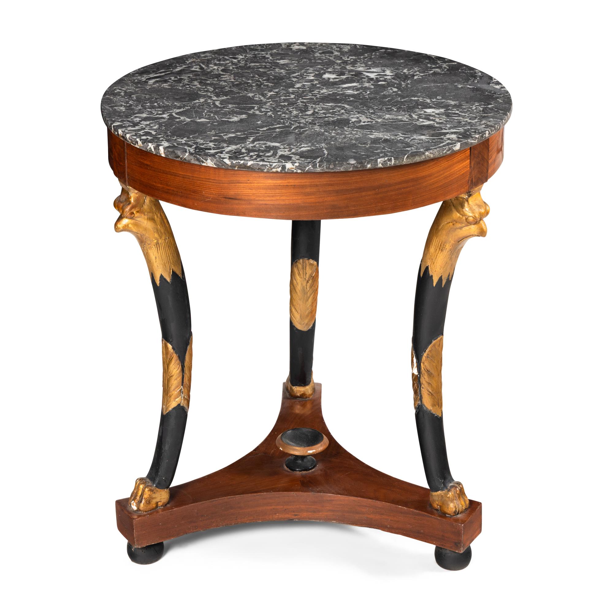 A Charles X Mahogany, Part Ebonized and Parcel Gilt Marble-Top Guéridon