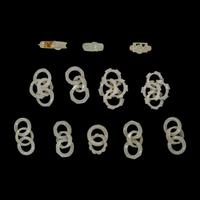 Nine Chinese Pale Celadon Jade Loop-Form Pendants and Three Rings, 20th Century — 近代 青白玉連環一組九件及戒指三枚