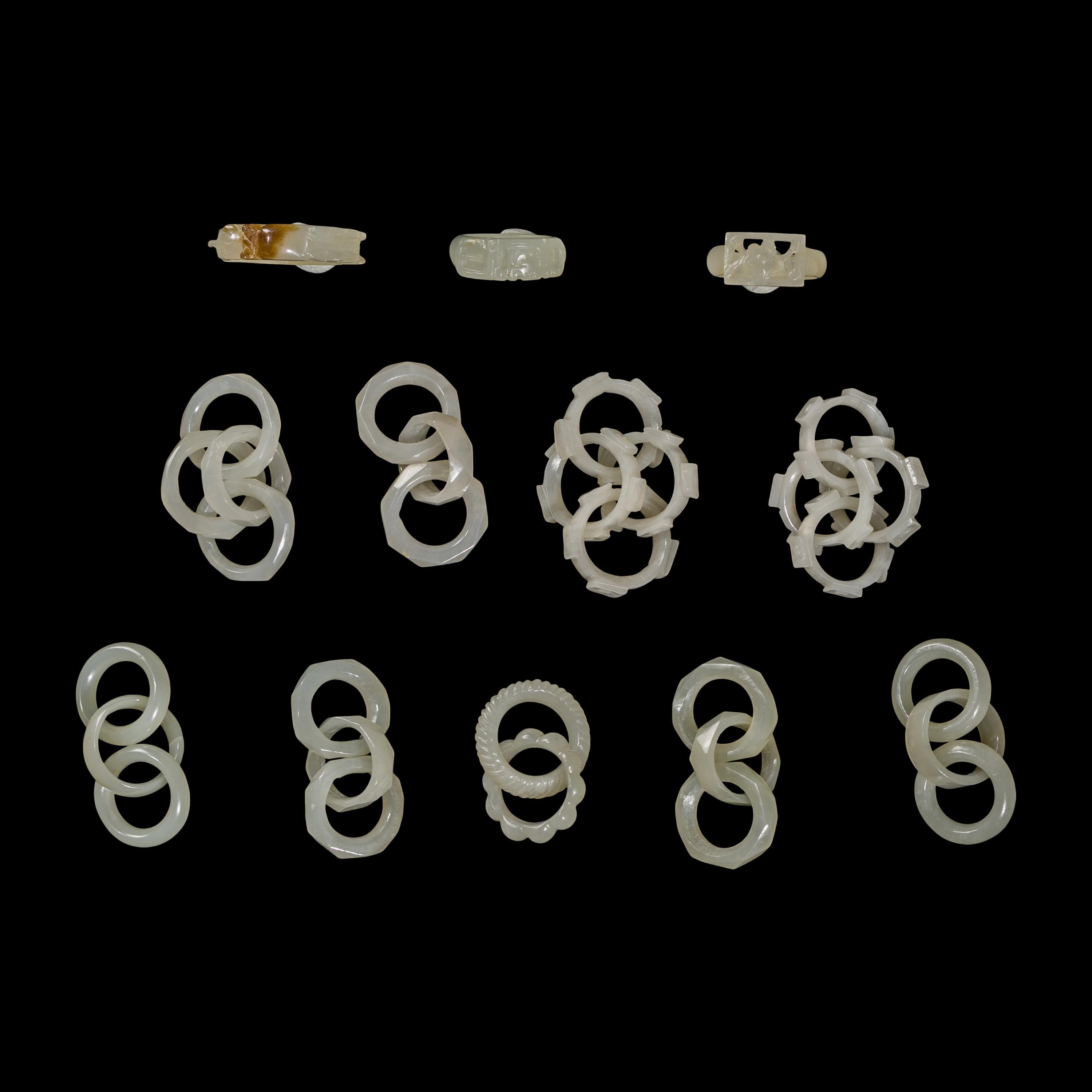 Nine Chinese Pale Celadon Jade Loop-Form Pendants and Three Rings, 20th Century — 近代 青白玉連環一組九件及戒指三枚