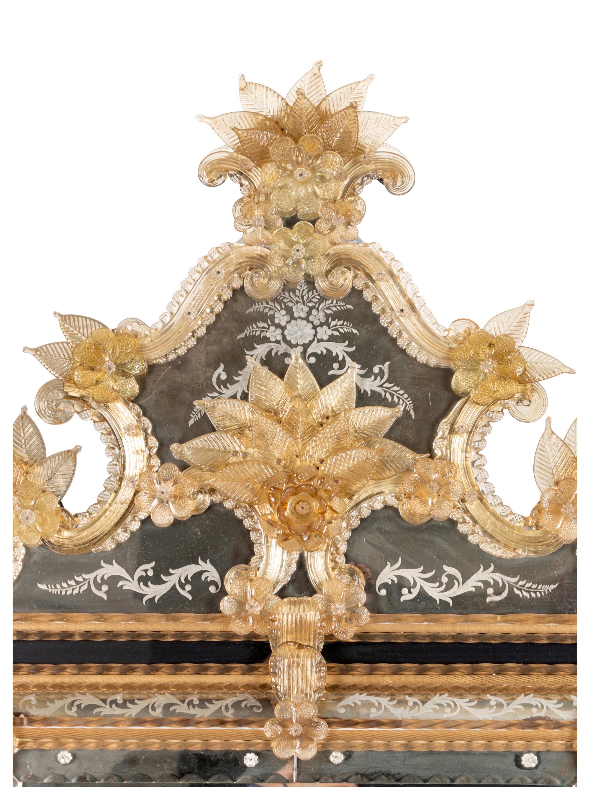 A Venetian Molded Glass Mirror