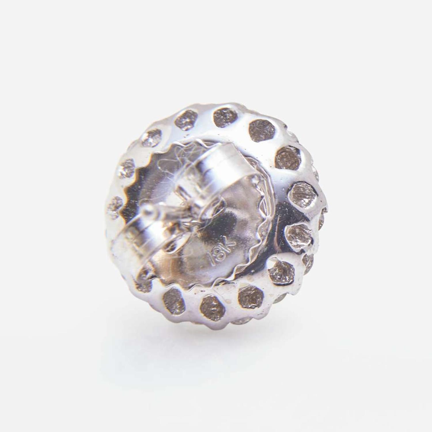 A Pair of 18K White Gold and Diamond Stud Earrings