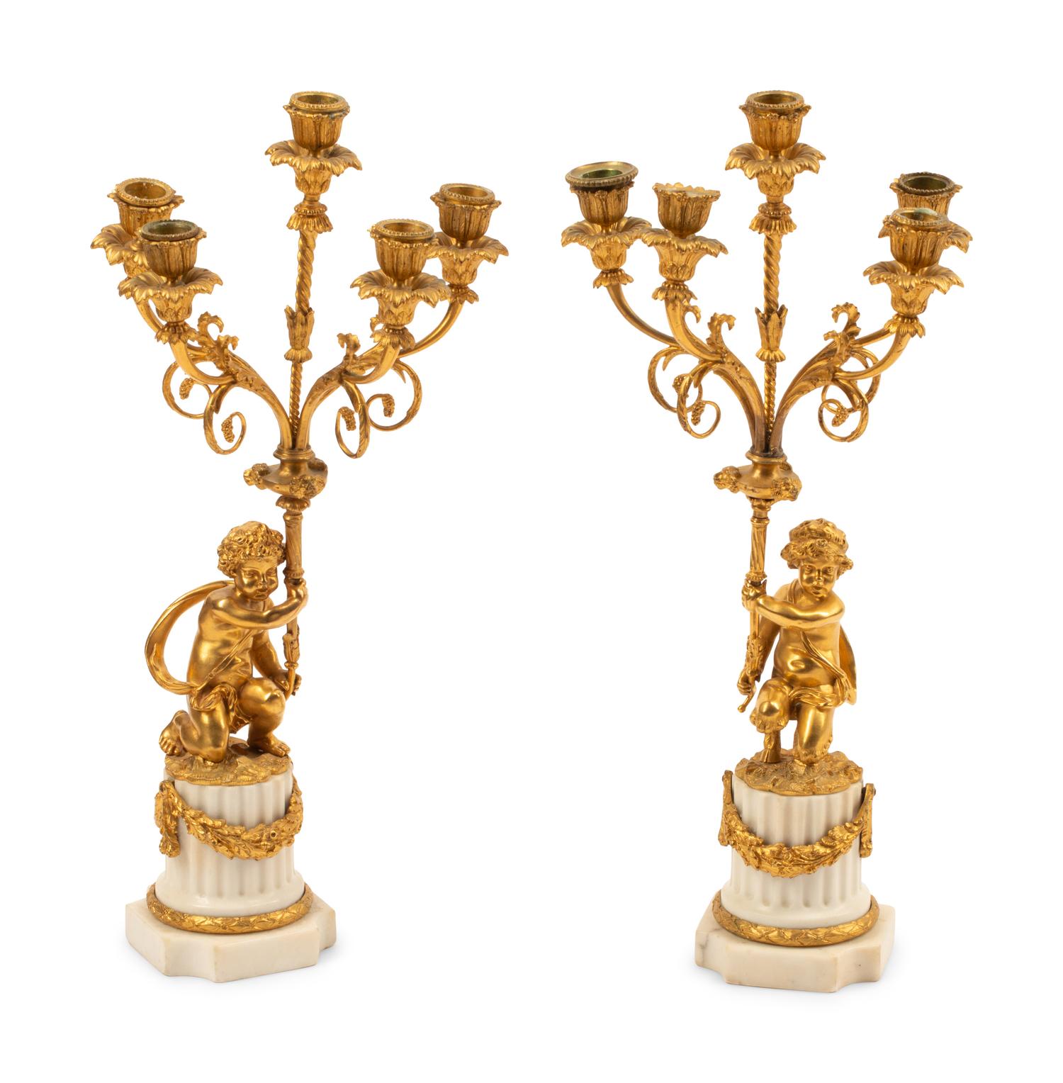 A Pair of Louis XVI Style Gilt Bronze and Marble Figural Candelabra