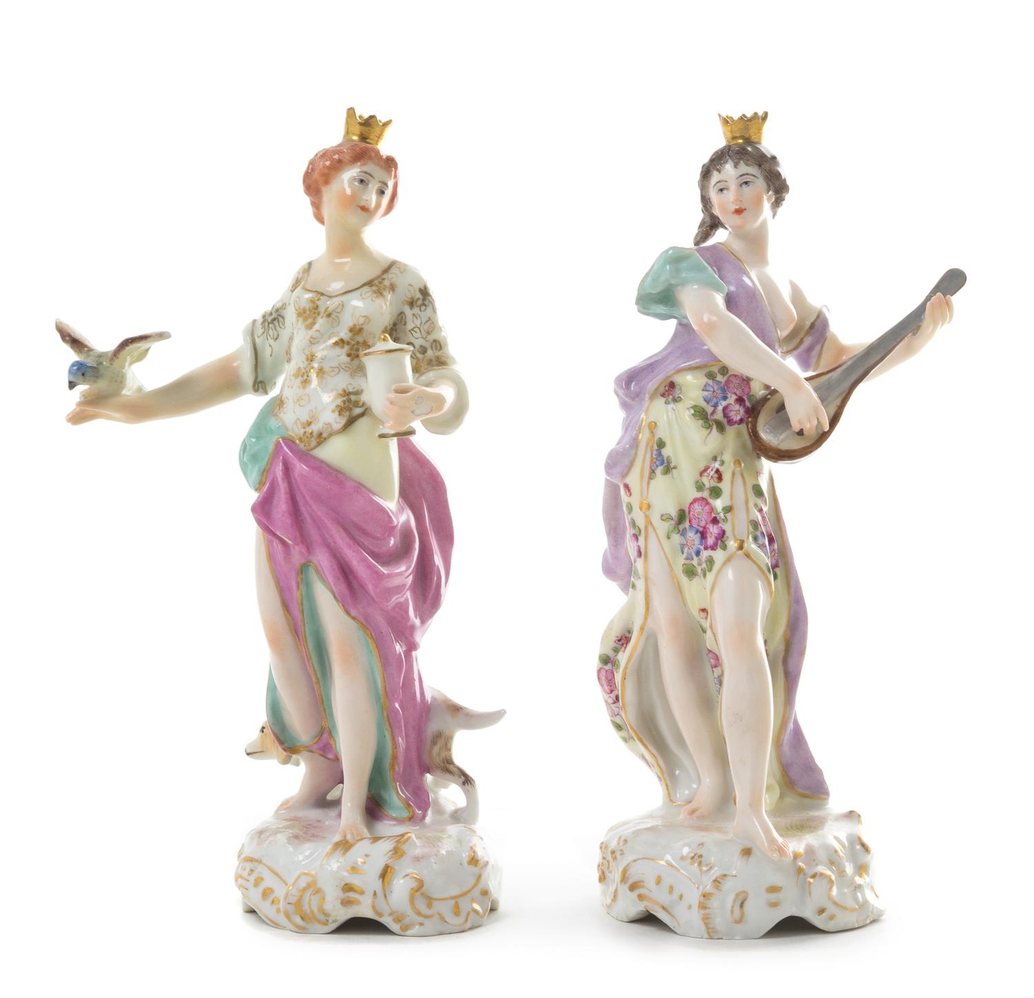 A Pair of Continental Porcelain Figures Height 7 inches.