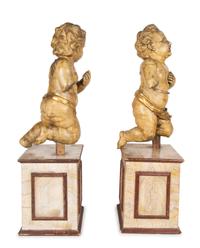 A Pair of Italian Carved and Parcel Gilt Cherubs — 19TH CENTURY