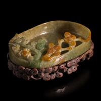 A Chinese Carved Jadeite "Pine and Spider" Brush Washer and Carved Wood Stand, Qing Dynasty — 清 翡翠鏤雕松紋洗