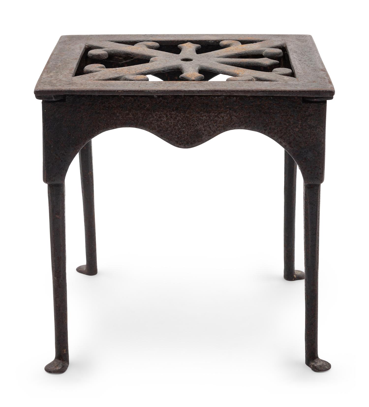 A Wrought and Cast Iron Kettle Stand