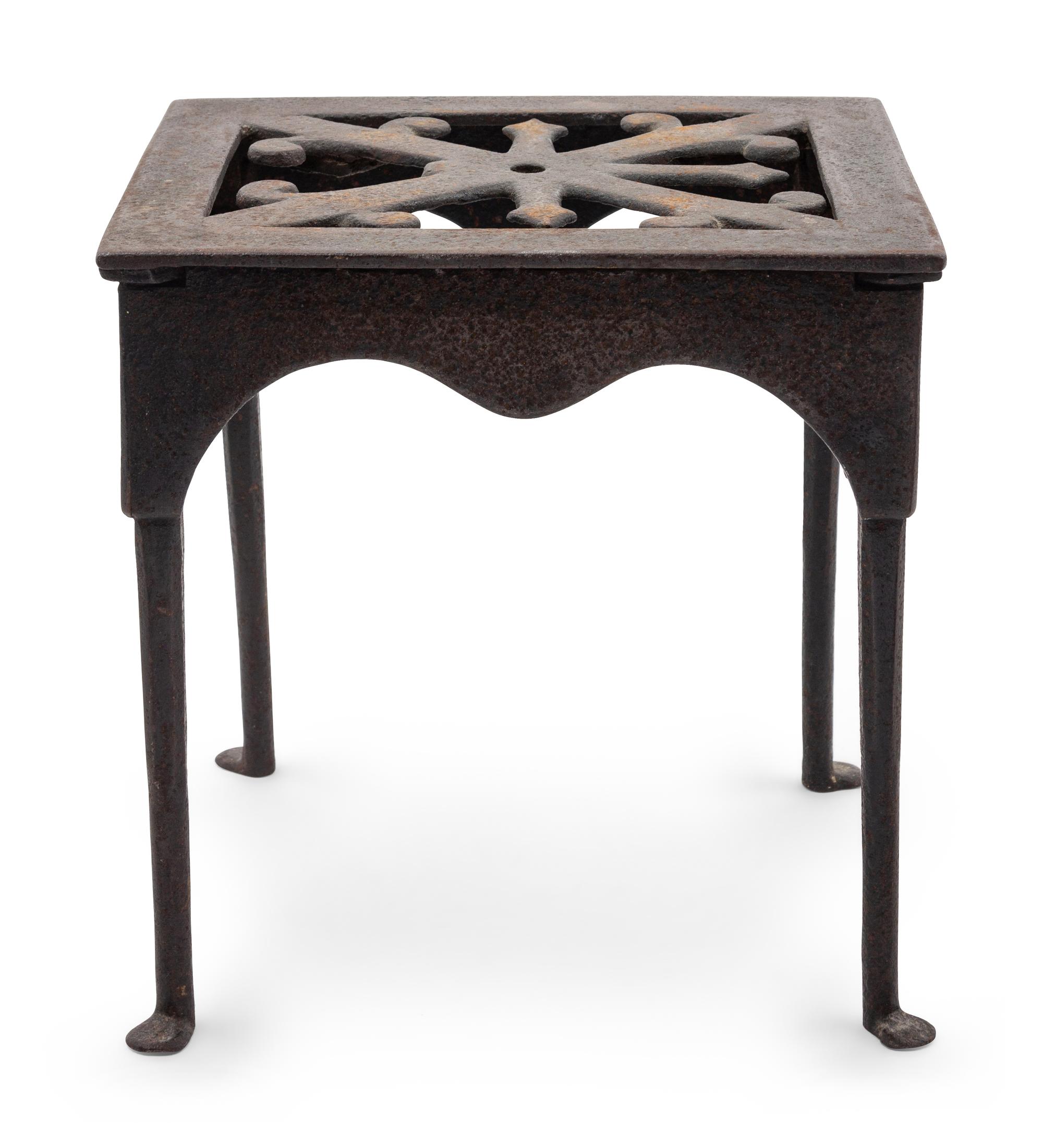 A Wrought and Cast Iron Kettle Stand