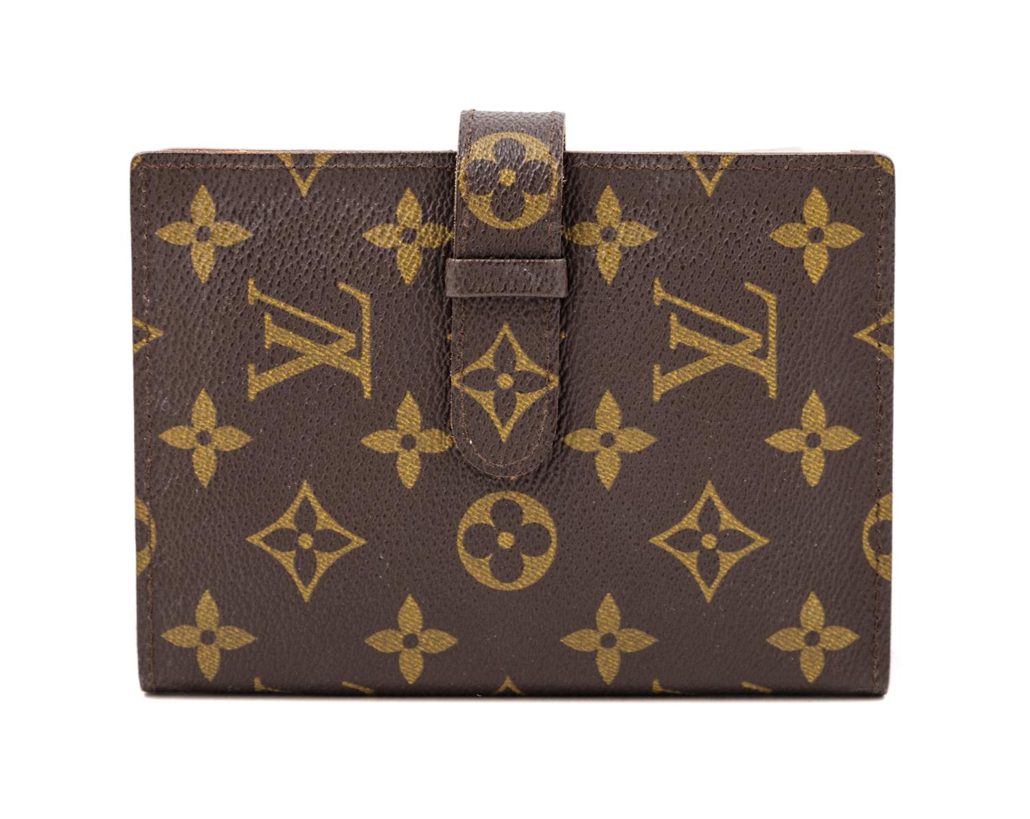 A Louis Vuitton Monogram Canvas Photo Album, 6" x 4.5" x 1".