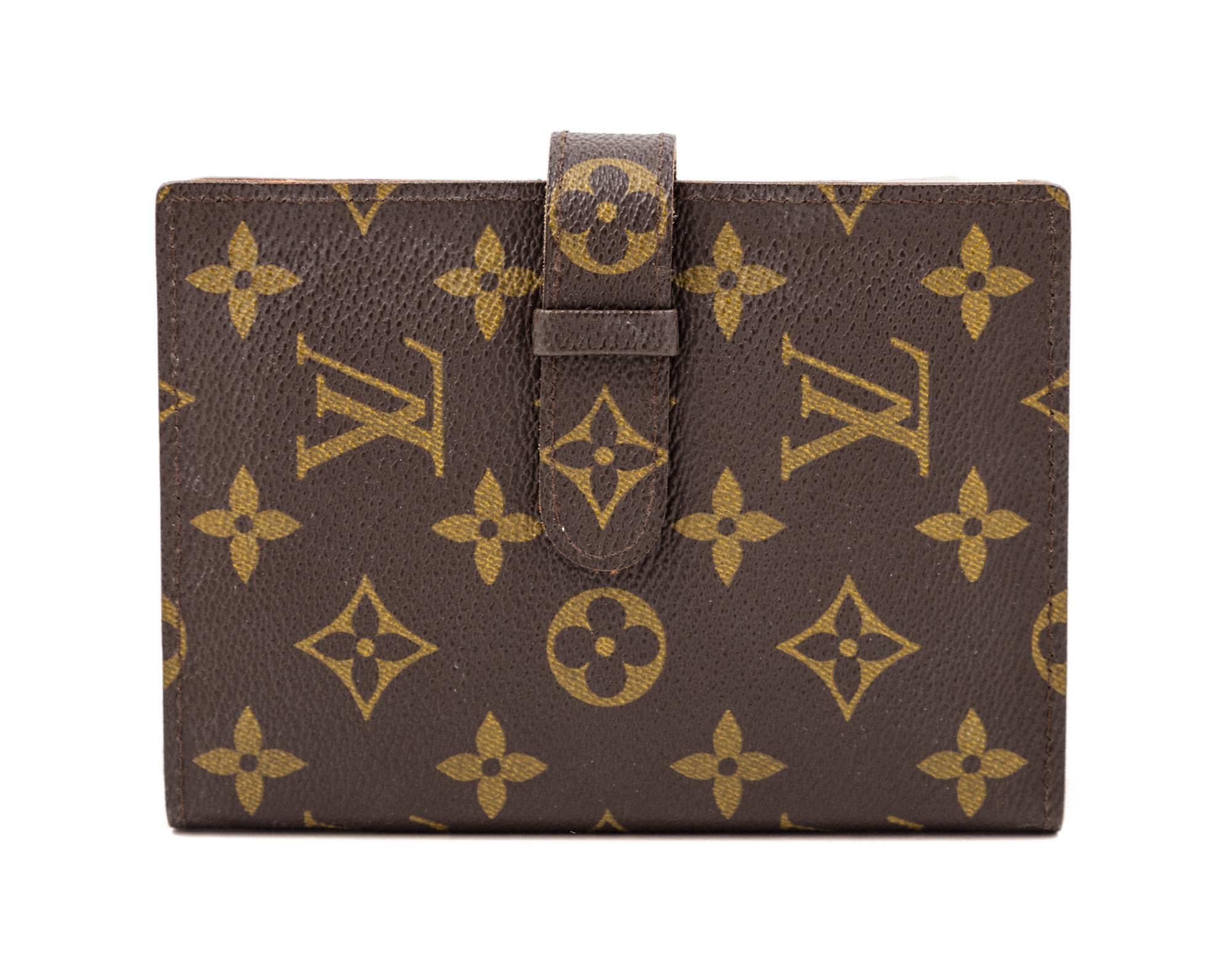 A Louis Vuitton Monogram Canvas Photo Album, 6" x 4.5" x 1".