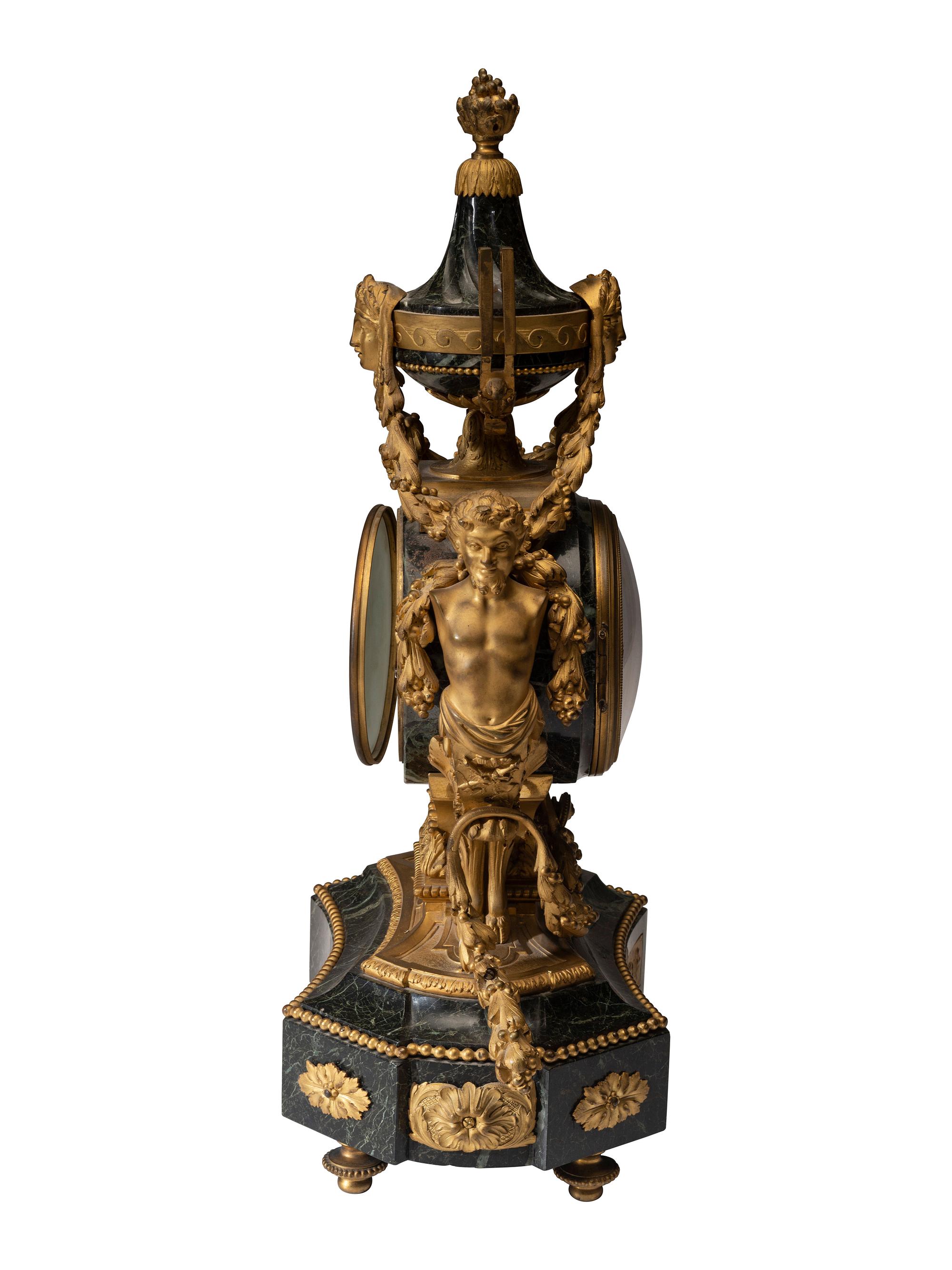 A Napoleon III Gilt Bronze and Marble Clock