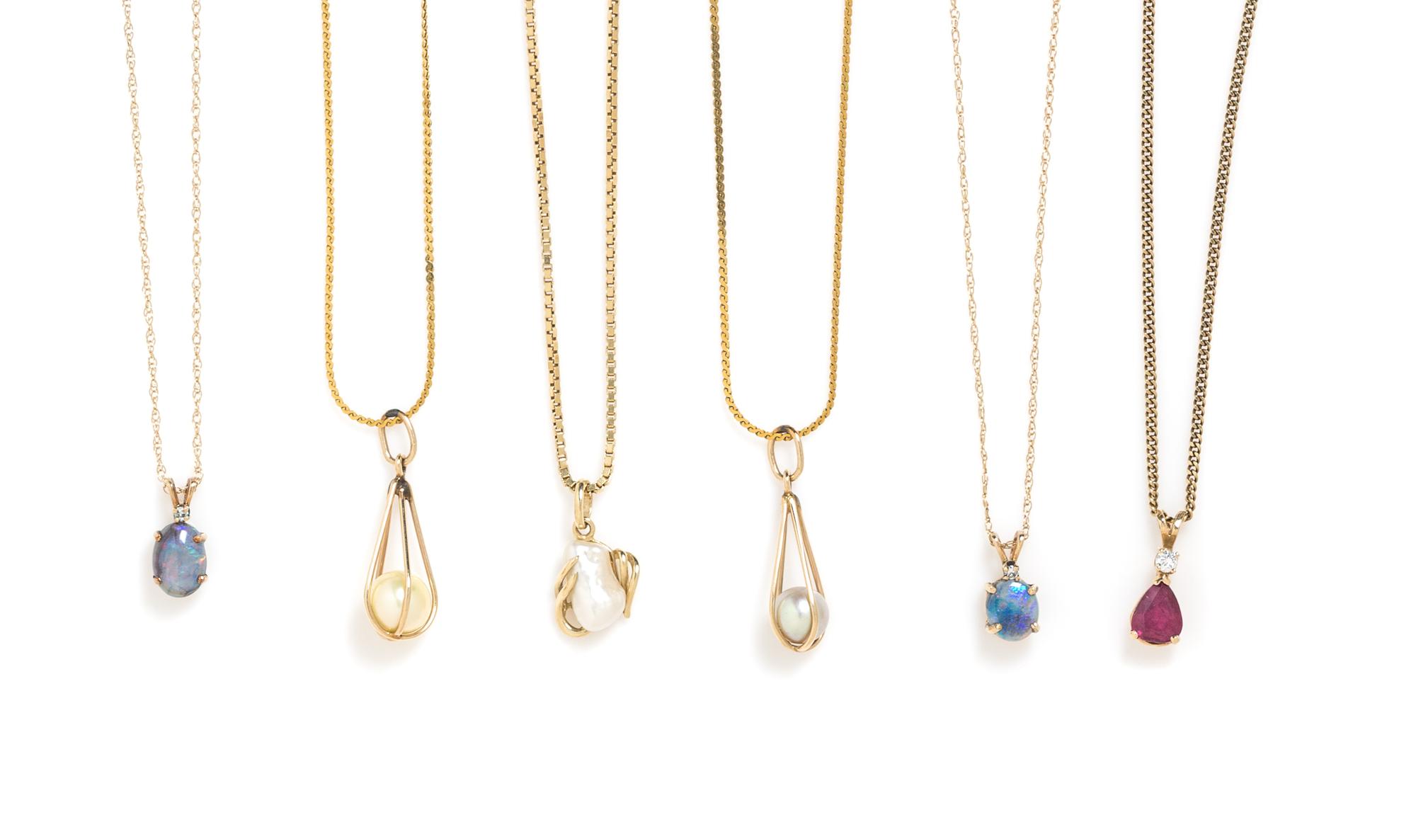A Collection of Yellow Gold and Gemstone Pendants, 13.65 dwts