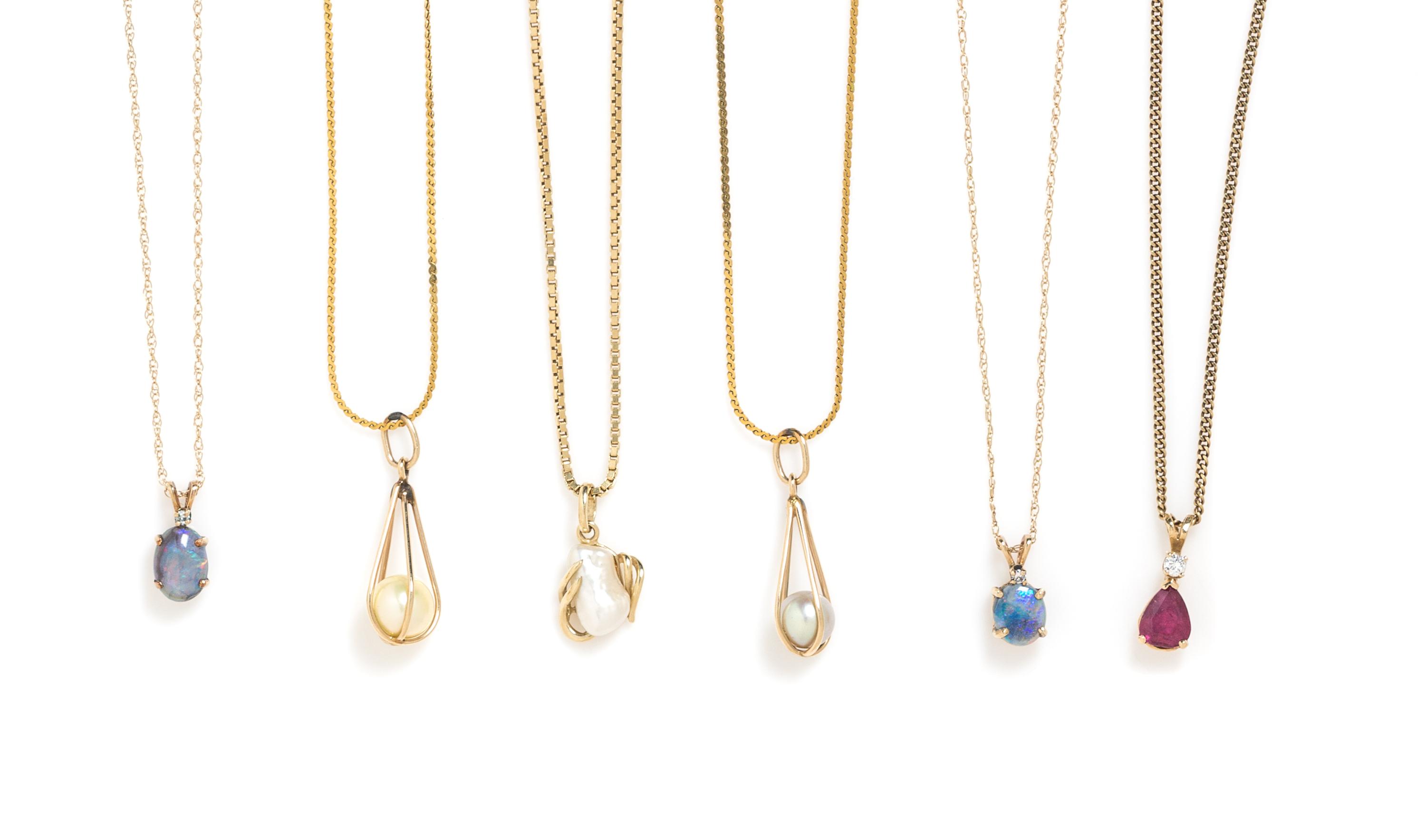 A Collection of Yellow Gold and Gemstone Pendants, 13.65 dwts