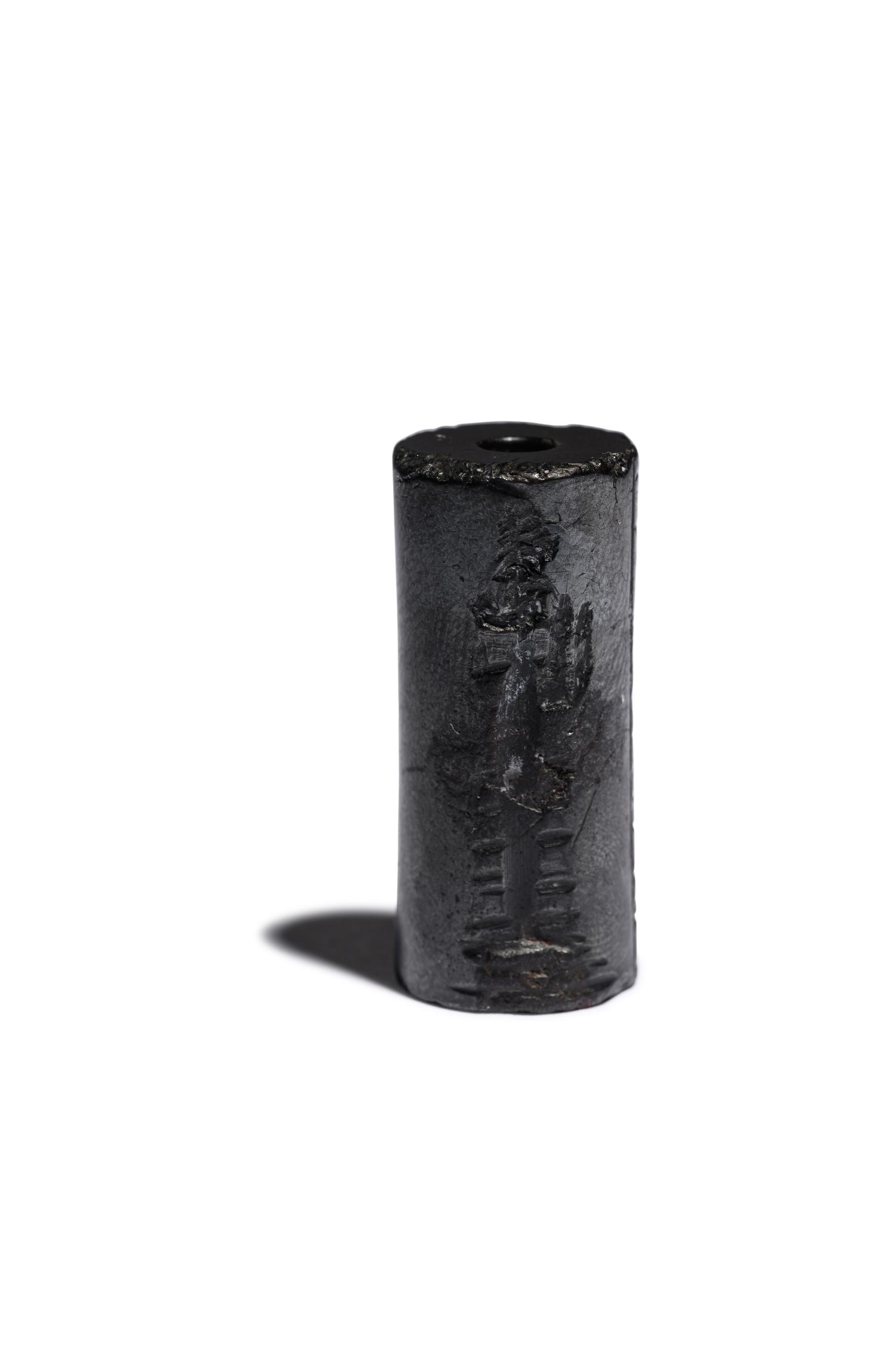 A Mesopotamian Hematite Cylinder Seal