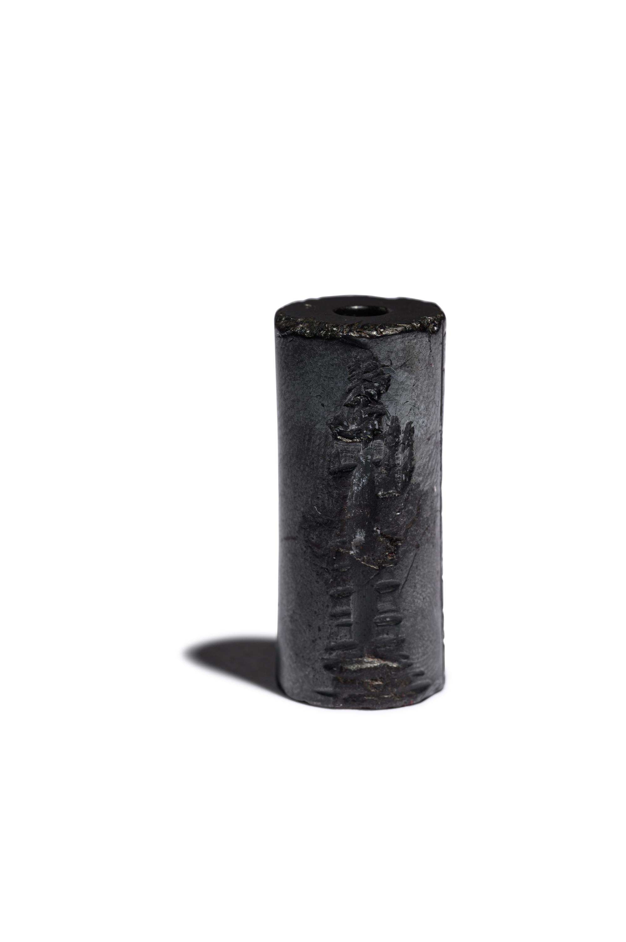 A Mesopotamian Hematite Cylinder Seal