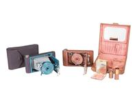 [EARLY PHOTOGRAPHY]. Two Kodak Petite Cameras, one with original vanity case.