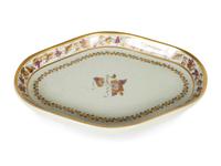 A Mottahedeh Porcelain Tureen, Underplate, and Spoon Rest
