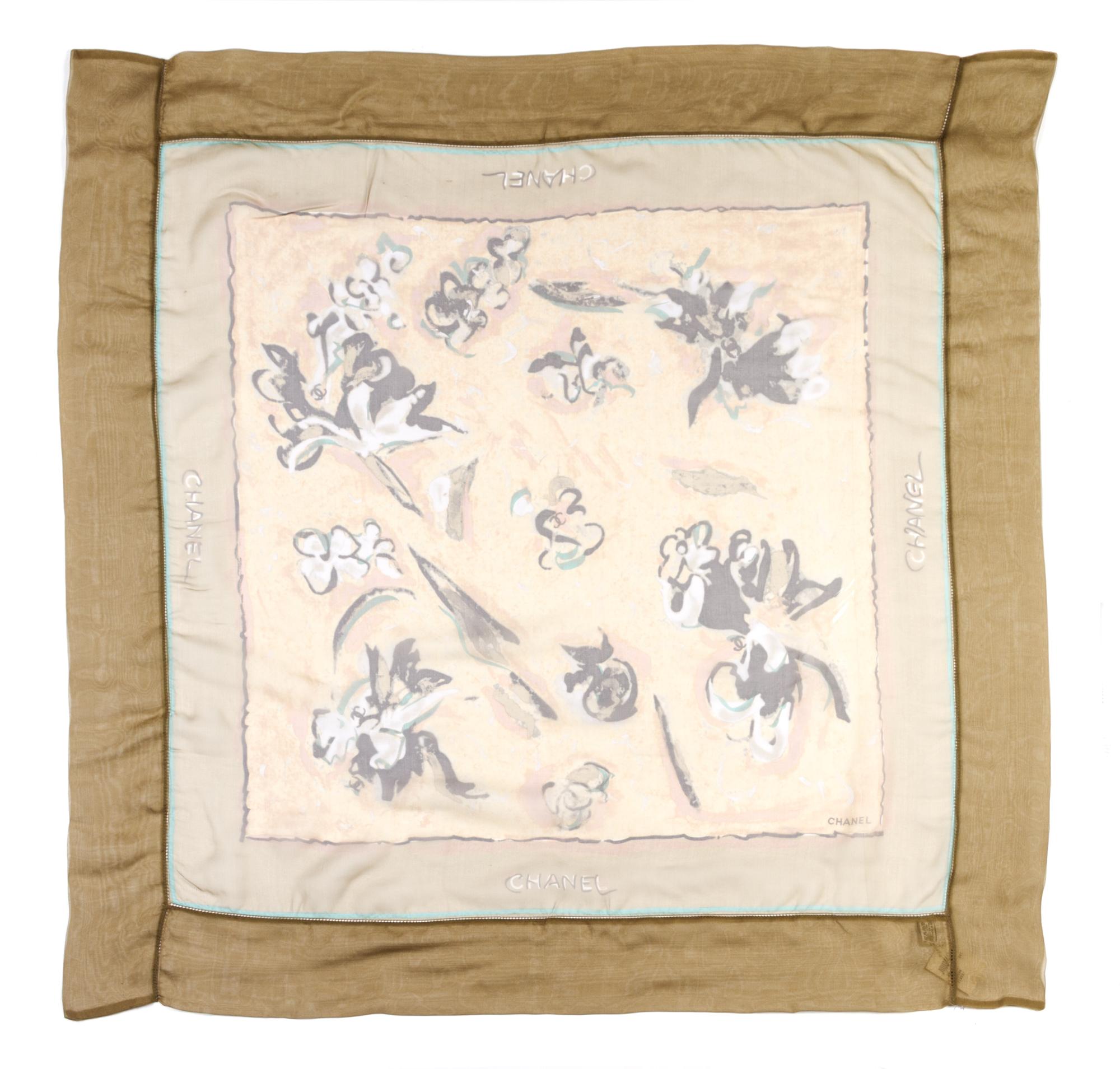 A Chanel Olive Silk Chiffon Scarf, 39 x 39 inches.