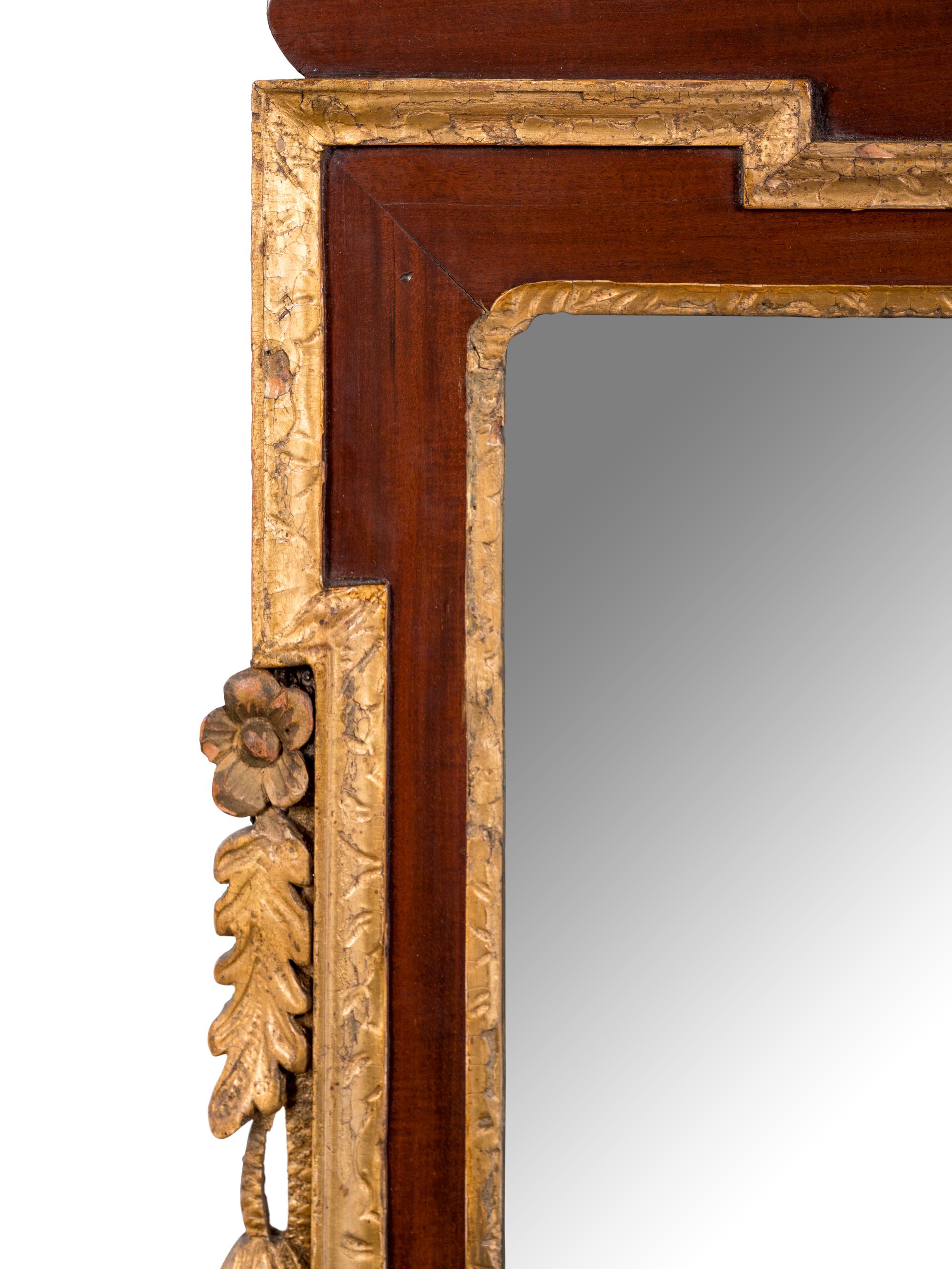 A George II Parcel Gilt Mahogany Mirror by Thomas Aldersey