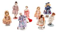 A Group of Eight Bisque Porcelain Dolls Height of tallest 5 5/8 inches.
