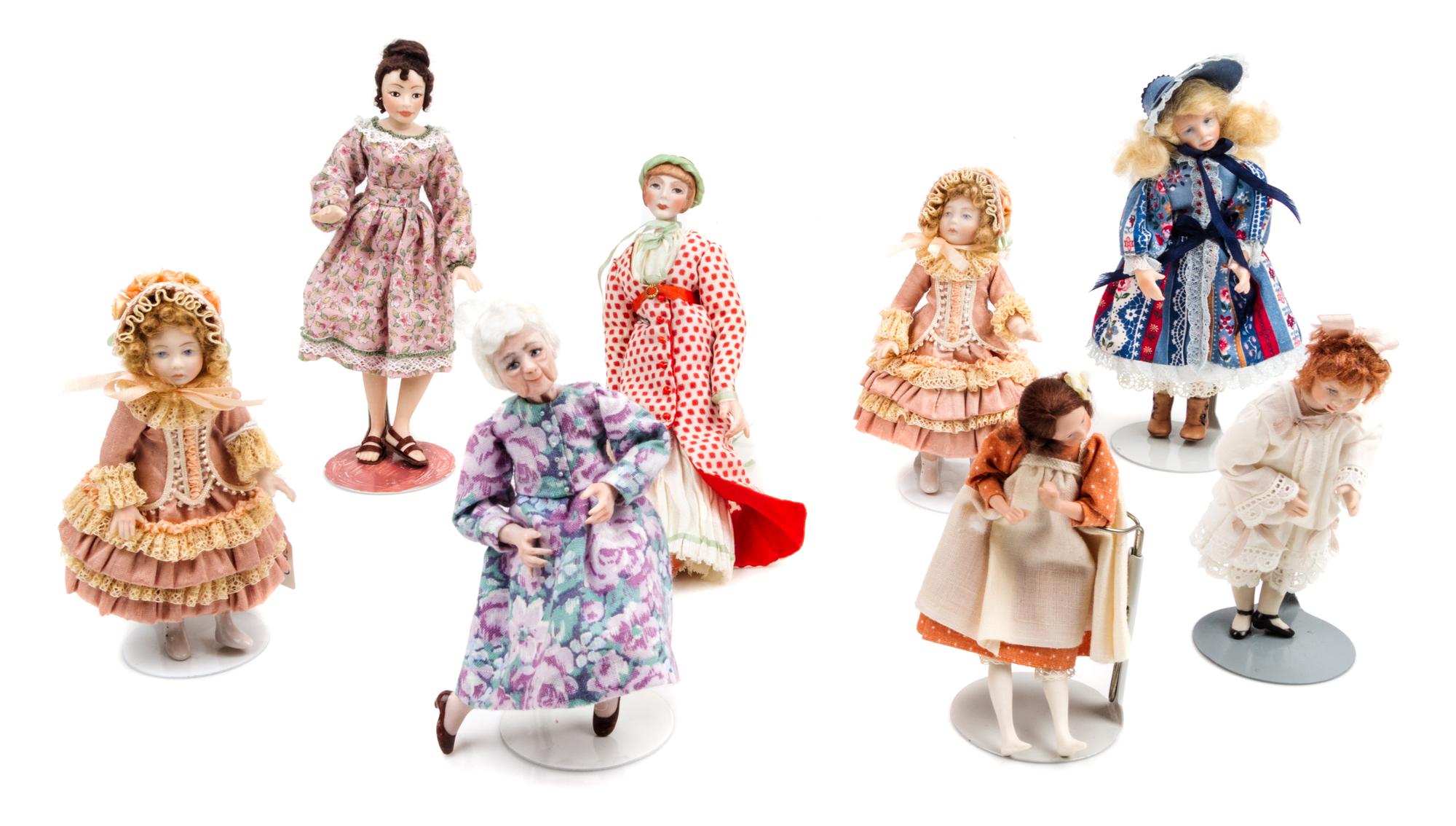 A Group of Eight Bisque Porcelain Dolls Height of tallest 5 5/8 inches.