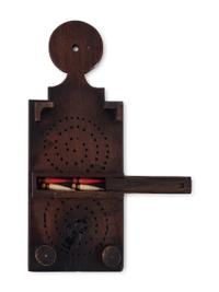 Two Carved Wood Game Elements