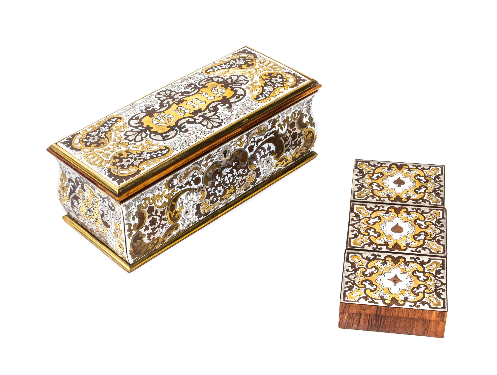 Two Continental Steel, Brass and Ivory Inlaid Boxes, Width of wider 9 5/8 inches.