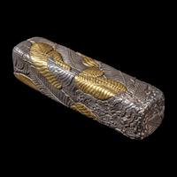 A Chinese Parcel-Gilt Silver Repoussé 'Plantain Leaves' Rectangular Scroll Box, Incised Qianlong Mark 清乾隆乙卯（1796）銀鎏金鏨蕉葉紋手卷機關盒